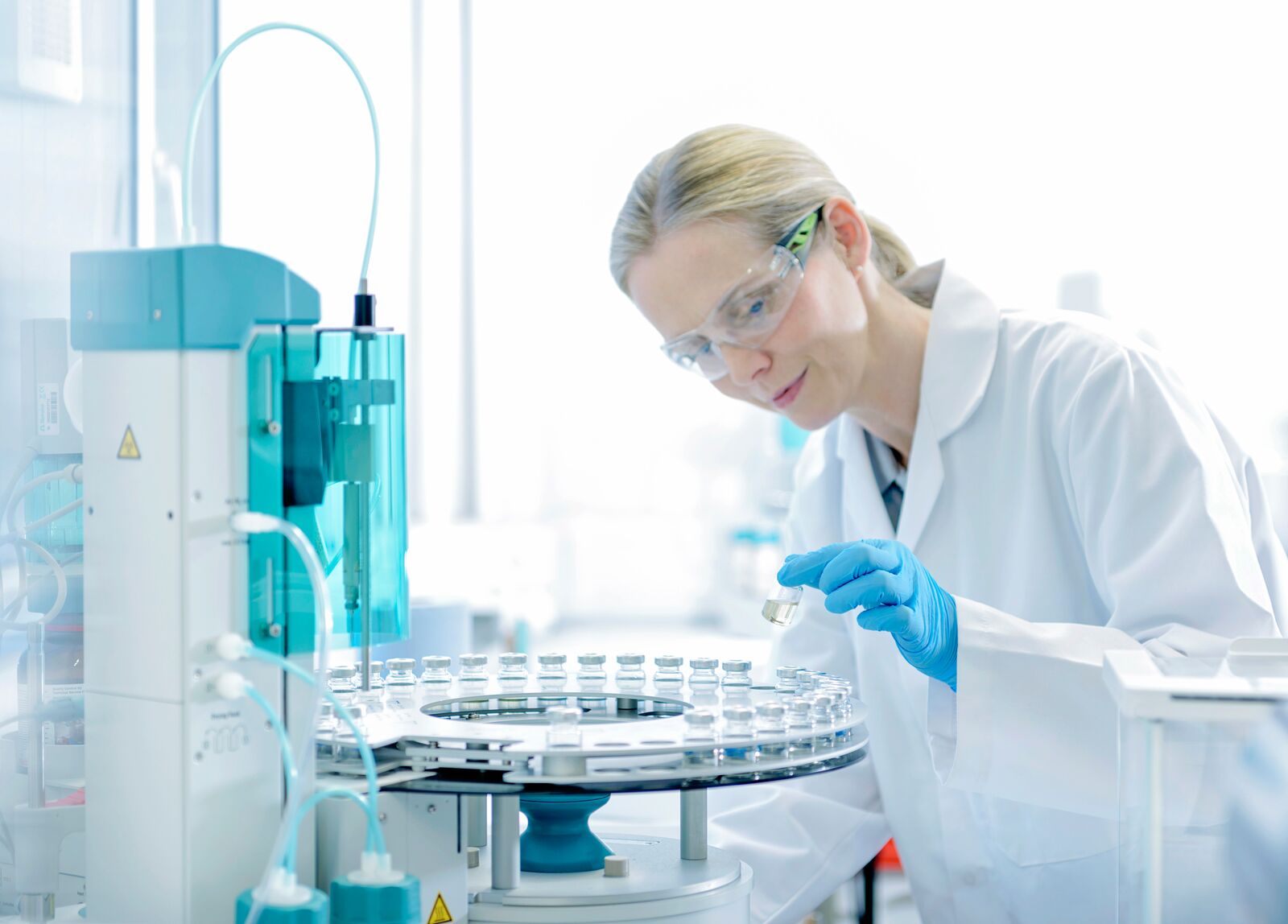 Quality control scientist examining samples in a professional laboratory